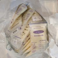 Healthy UK mum selling surplus frozen breastmilk - preferably in bulk